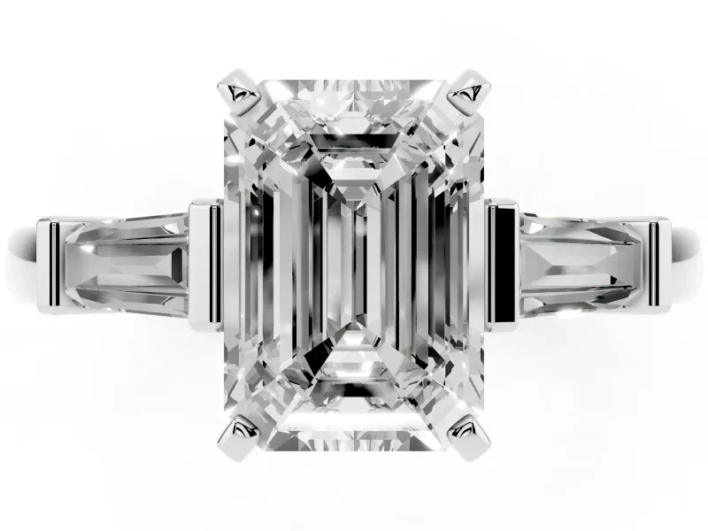 Emerald Cut Diamond Solitaire Ring Set in White gold with Tapered Baguette Accents and Prong Setting
