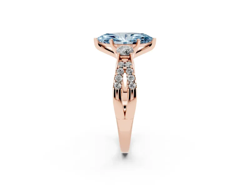 Fancy Blue Marquise Cut Diamond Three-Stone Ring Set in Rose gold with Pavé Split Shank and Prong Setting