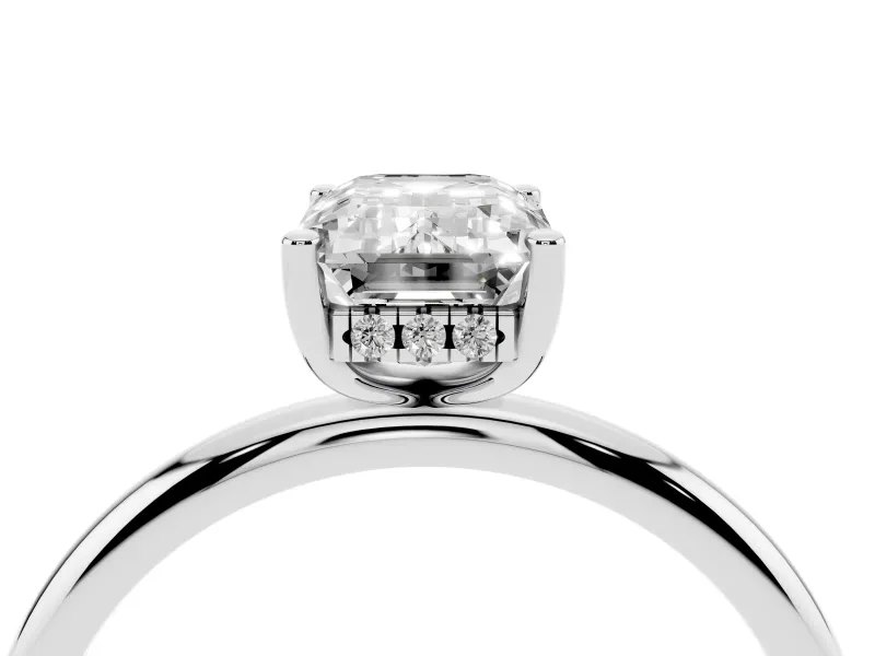 Emerald Cut Diamond Solitaire Engagement Ring Set in Silver with Prong Setting and Polished Band