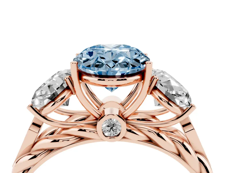 Fancy Blue Oval Cut Diamond Three-Stone Ring Set in Rose gold with Braided Band