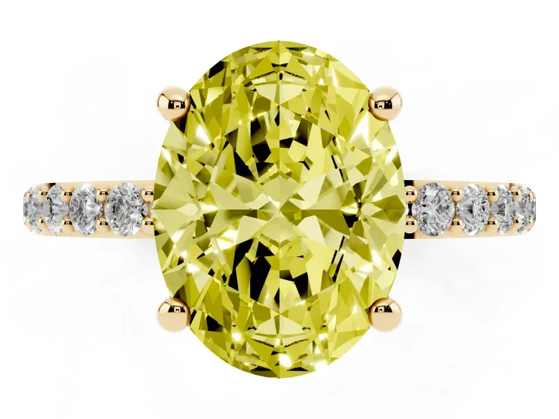 Fancy Yellow Oval Cut Diamond Solitaire Ring Set in Yellow gold with Round Pavé Band and Prong Setting