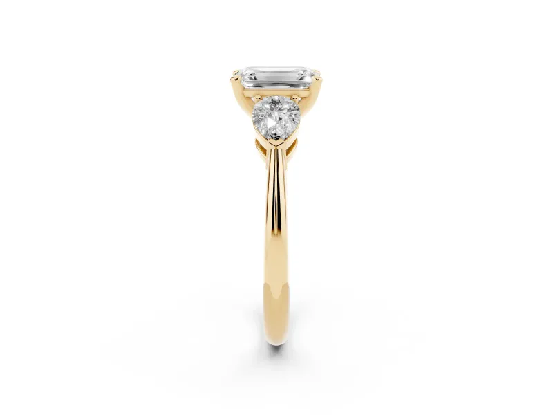Emerald Cut Three-Stone Engagement Ring Setting | Pear Side Stones | Yellow Gold