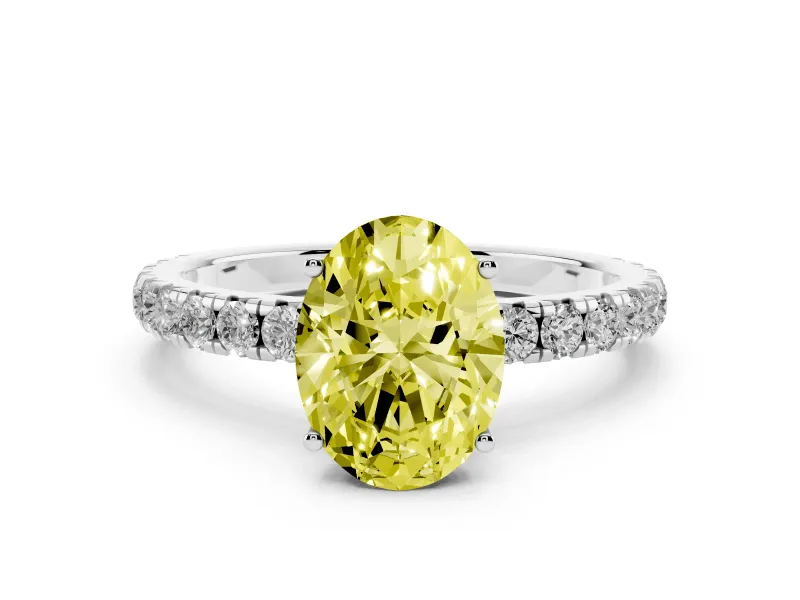Fancy Yellow Oval Cut Diamond Pavé Solitaire Engagement Ring Set in Platinum with Prong Setting