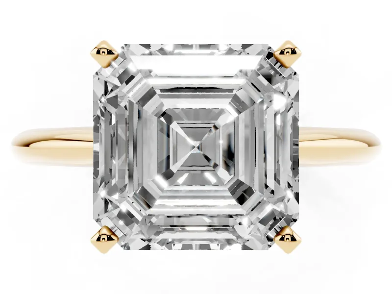 Asscher Cut Diamond Solitaire Ring Set in Yellow gold with Prong Setting on a Plain Round Band