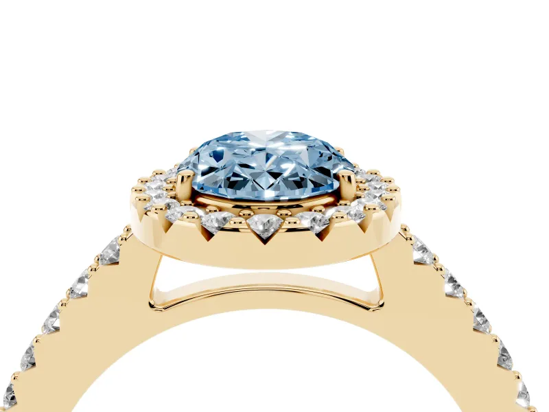 Fancy Blue Oval Cut Diamond Halo Pavé Solitaire Ring Set in Yellow gold with Prong-Set Center Stone
