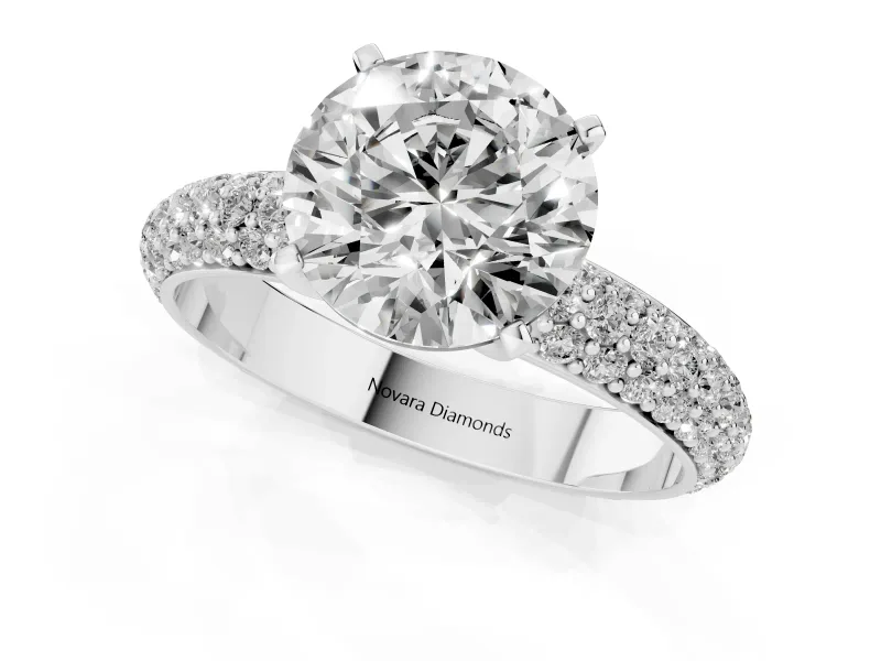 Round Cut Diamond Solitaire Ring Set in Platinum with Prong Setting and Pavé-Set Band