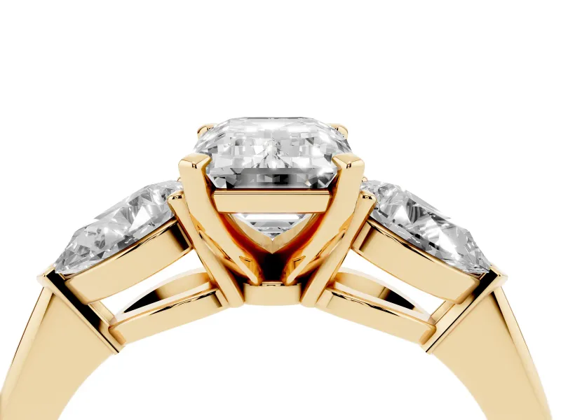 Emerald Cut Three-Stone Engagement Ring Setting | Pear Side Stones | Yellow Gold