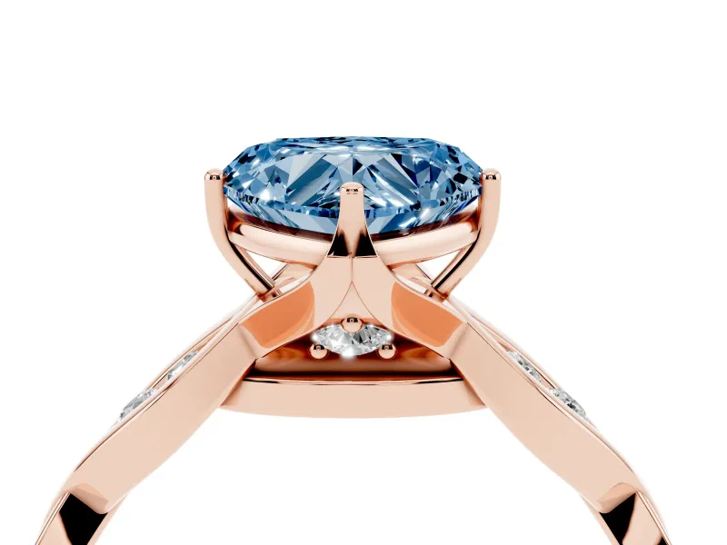 Fancy Blue Heart Cut Diamond Twist Band Solitaire Ring Set in Rose gold with Leaf Prong Setting and Accent Stones