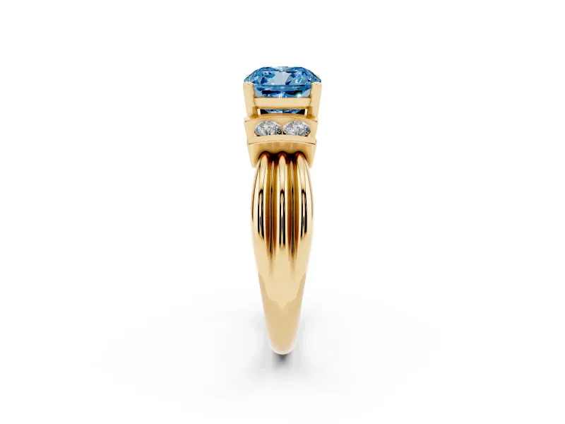 Fancy Blue Three-Stone Cushion Cut Diamond Channel Set Ring Set in Yellow gold with Bar Prongs