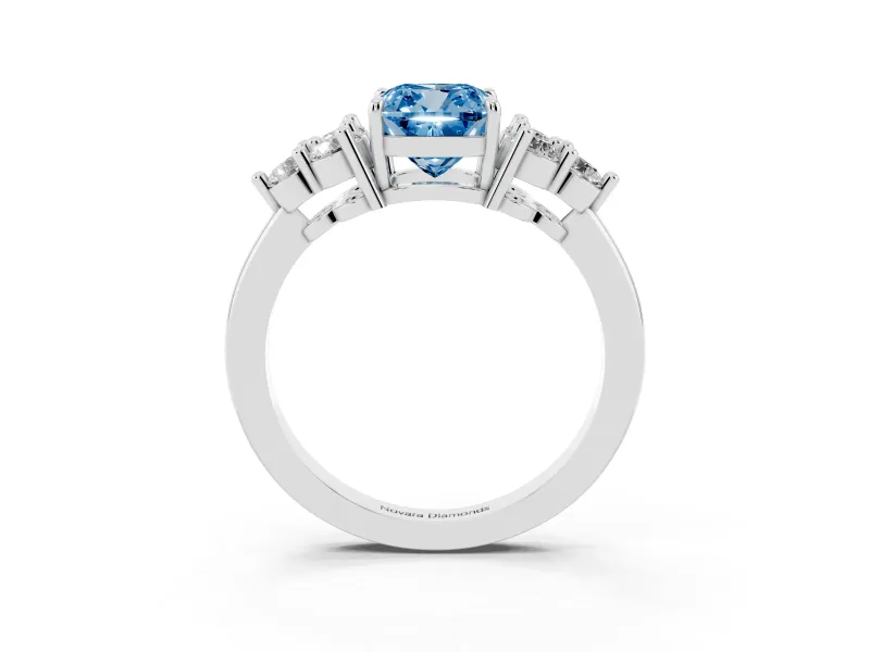 Fancy Blue Cushion Cut Diamond Solitaire Ring Set in White gold with Cluster Accents on Each Side