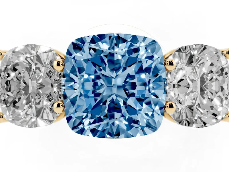 Cushion Cut Three Stone Engagement Ring Setting for a Fancy Blue Lab-Grown Diamond | Basket Prong Heads | Yellow Gold