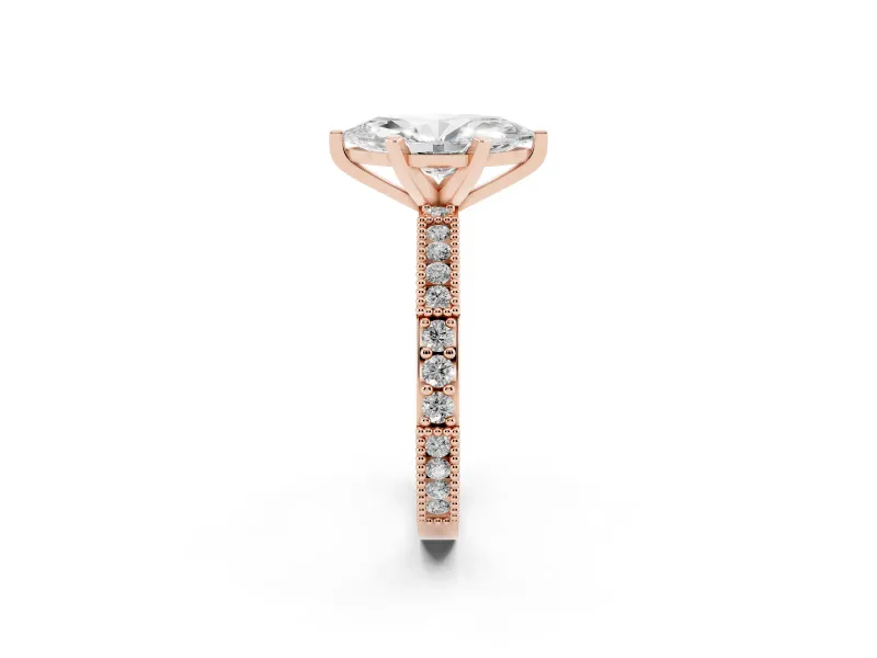 Marquise Cut Diamond Solitaire Ring Set in Rose gold with Slim Pavé Band and Prong Setting