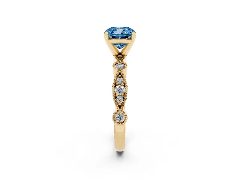 Fancy Blue Cushion Cut Diamond Solitaire Engagement Ring Set in Yellow gold with Milgrain Bezel Accent Band