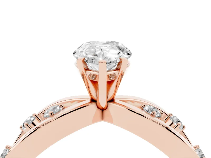 Pear Cut Diamond Solitaire Ring Set in Rose gold with Side Stones on Criss-Cross Band and Prong Setting