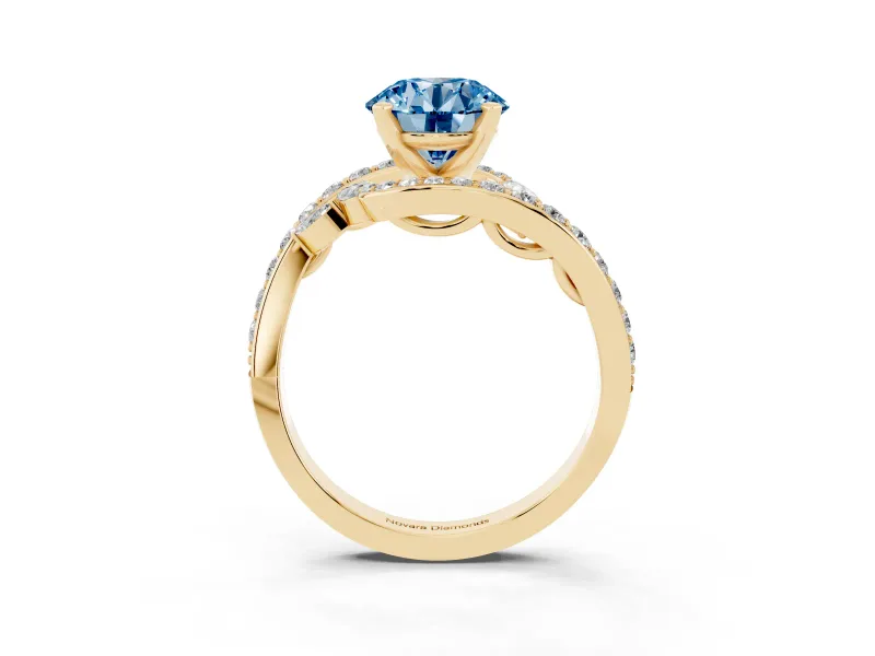 Fancy Blue Round Cut Diamond Solitaire Ring Set in Yellow gold with Pavé Twist Band and Secure Prong Setting