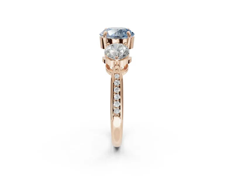 Round Three Stone Engagement Ring Setting for a Fancy Blue Lab-Grown Diamond | Tapered Pave Band | Rose Gold