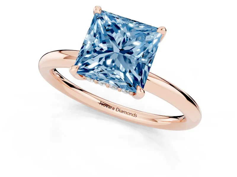 Fancy Blue Princess Cut Diamond Solitaire Ring Set in Rose gold with Thin Band and Prong Setting