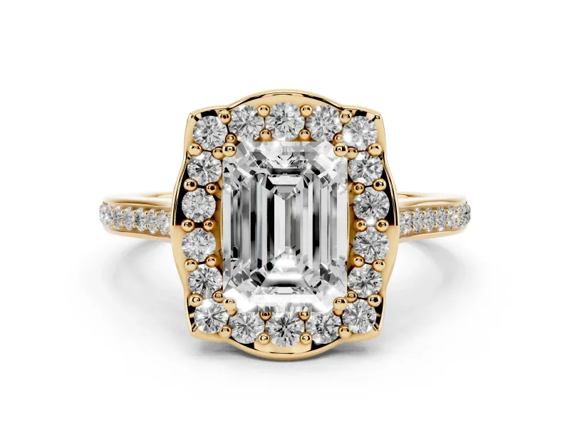 Emerald Cut Diamond Halo Ring Set in Yellow gold with Pavé-Lined Shoulders and Prong Setting