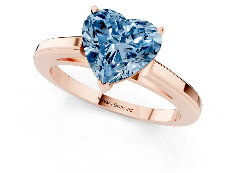 Fancy Blue Heart Cut Diamond Solitaire Ring Set in Rose gold with Prong Setting and Classic Band