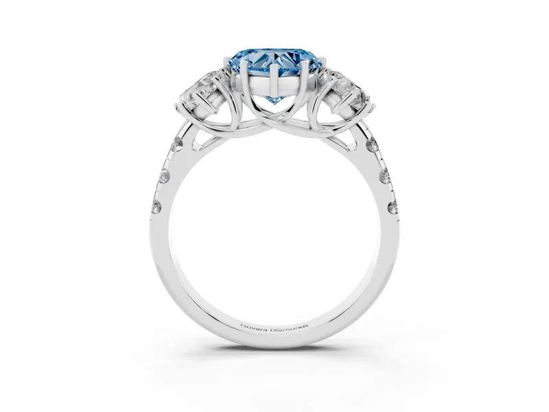 Fancy Blue Heart Cut Diamond Three-Stone Ring Set in Platinum with Pavé Band