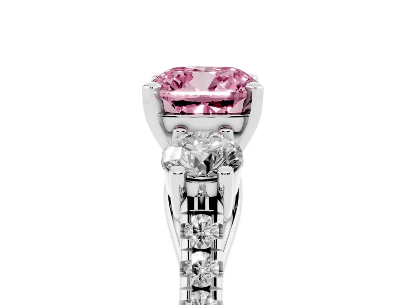 Fancy Pink Three-Stone Cushion Cut Diamond Pavé Band Ring Set in Platinum with Prong-Set Trio