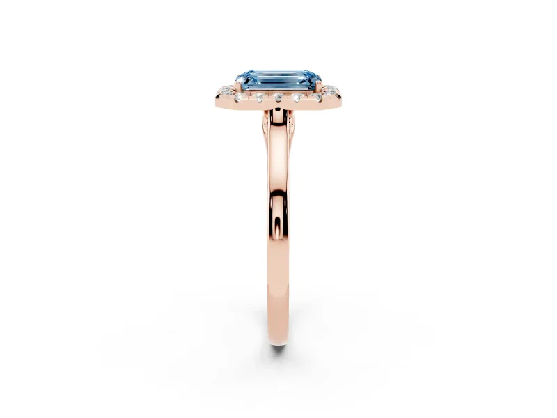 Fancy Blue Emerald Cut Halo Round Diamond Solitaire Ring Set in Rose gold with Pavé Band and Prong Setting