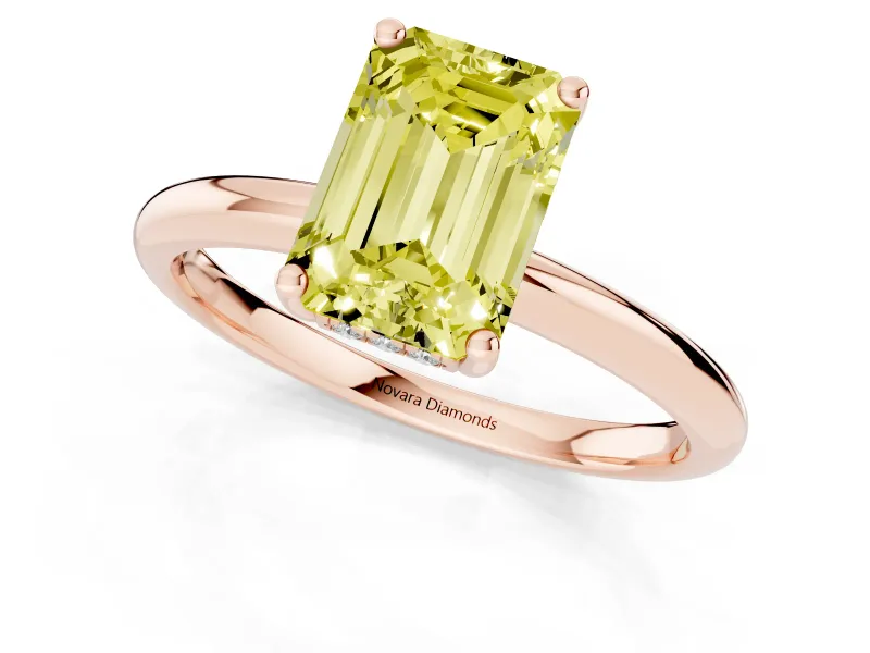 Fancy Yellow Emerald Cut Diamond Solitaire Engagement Ring Set in Rose gold with Prong Setting and Polished Band