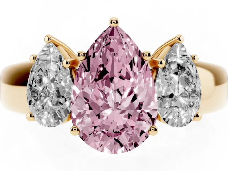 Fancy Pink Three-Stone Pear Cut Diamond Ring Set in Yellow gold with Matching Prong Settings and Plain Band