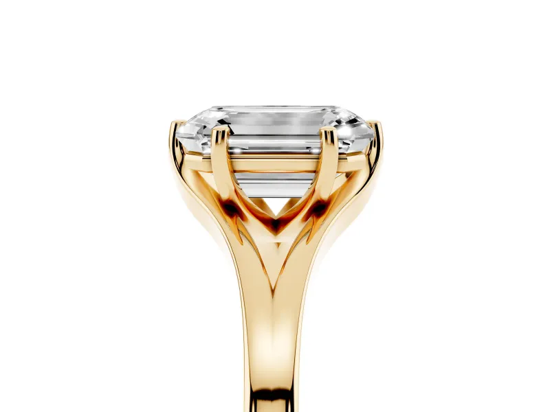Emerald Cut Diamond Solitaire Ring Set in Yellow gold with Polished Tapered Band and Prong Setting