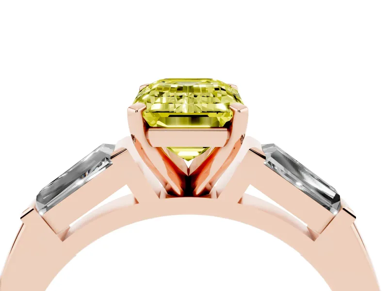 Fancy Yellow Emerald Cut Diamond Solitaire Ring Set in Rose gold with Tapered Baguette Side Stones and Prong Setting