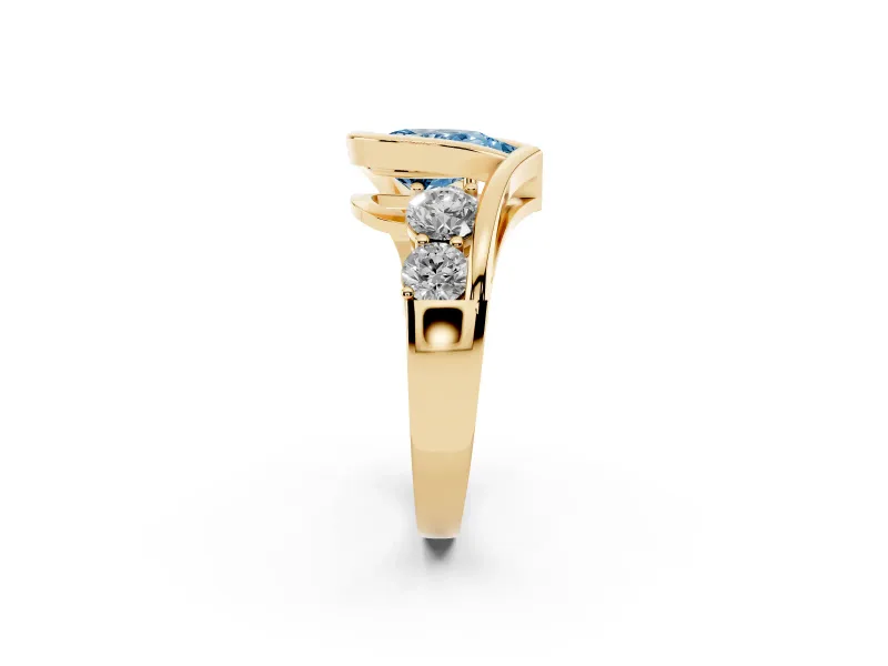 Fancy Blue Pear Cut Diamond Bezel Bypass Ring Set in Yellow gold with Round Accents
