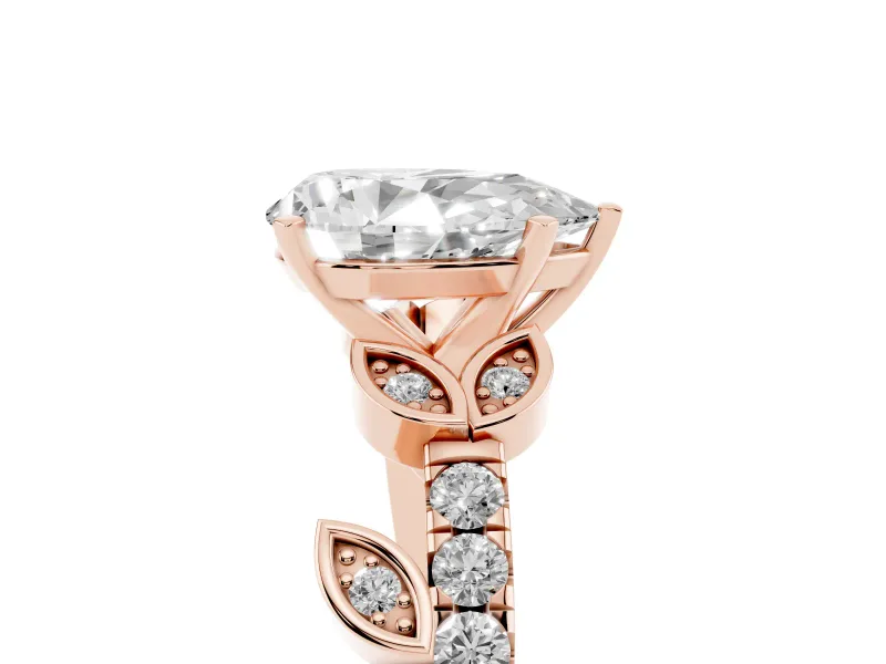 Pear Cut Diamond Solitaire Leaf-Inspired Ring Set in Rose gold with Pavé Band and Prong Setting