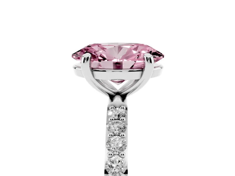 Fancy Pink Oval Cut Diamond Solitaire Ring Set in Platinum with Round Pavé Band and Prong Setting
