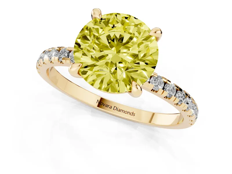 Fancy Yellow Round Cut Diamond Brilliant Solitaire Ring Set in Yellow gold with Pavé Band and Prong Setting