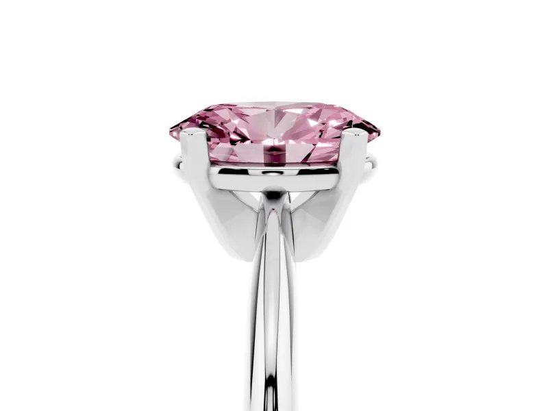 Fancy Pink Oval Cut Diamond Solitaire Ring Set in Platinum with Prong Setting on a Plain Round Band