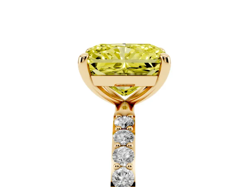 Fancy Yellow Radiant Cut Diamond Solitaire Ring Set in Yellow gold with Round Pavé Band and Prong Setting