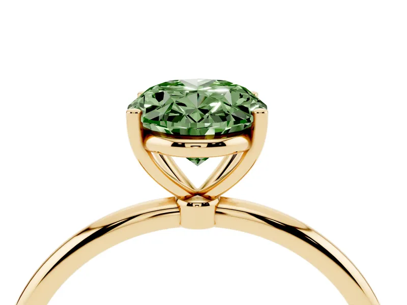 Fancy Green Oval Cut Diamond Solitaire Engagement Ring Set in Yellow gold with Thin Band and Prong Setting