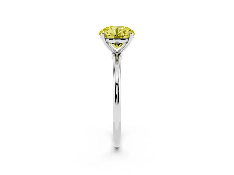 Fancy Yellow Round Cut Diamond Solitaire Engagement Ring Set in Platinum with Thin Band and Prong Setting