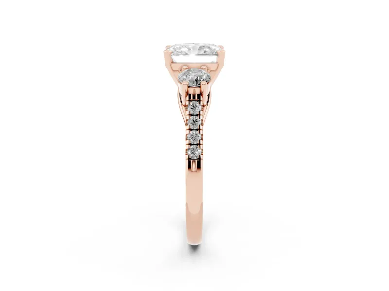 Three-Stone Radiant Cut Diamond Pavé Band Ring Set in Rose gold with Prong-Set Trio