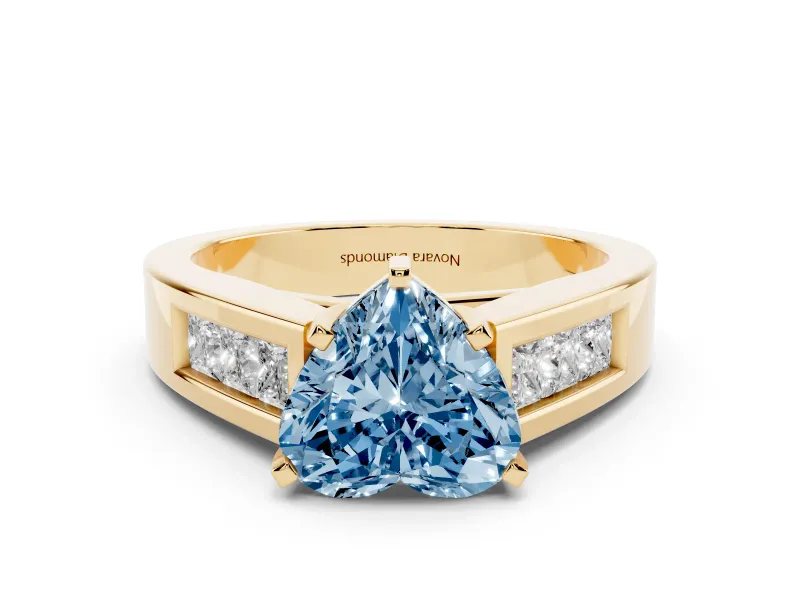 Fancy Blue Heart Cut Diamond Solitaire Ring Set in Yellow gold with Channel-Set Accent Stones and Prong Setting