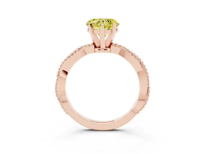 Fancy Yellow Heart Cut Diamond Solitaire Ring Set in Rose gold with Twisted Band and Bead Prong Setting