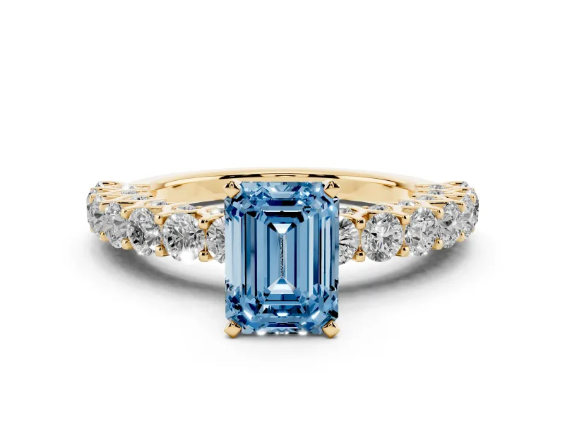 Fancy Blue Emerald Cut Diamond Solitaire Ring Set in Yellow gold with Shared Prong Pavé Band