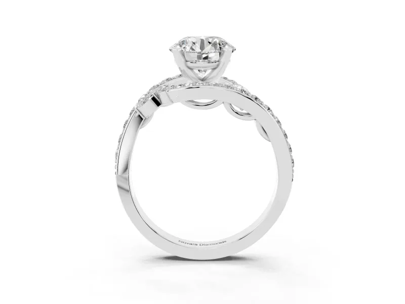 Round Cut Diamond Solitaire Ring Set in White gold with Pavé Twist Band and Secure Prong Setting
