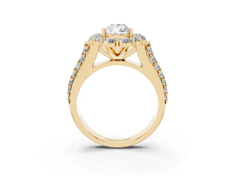 Pear Cut Diamond Halo Engagement Ring Set in Yellow gold with Split Shank and Prong Setting