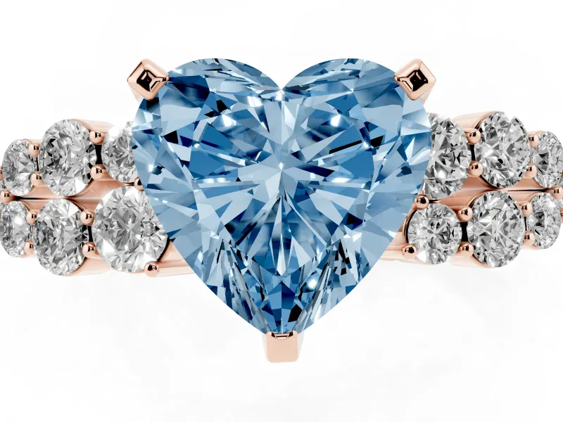 Fancy Blue Heart Cut Diamond Cluster Engagement Ring Set in Rose gold with Pavé Band and Prong Setting