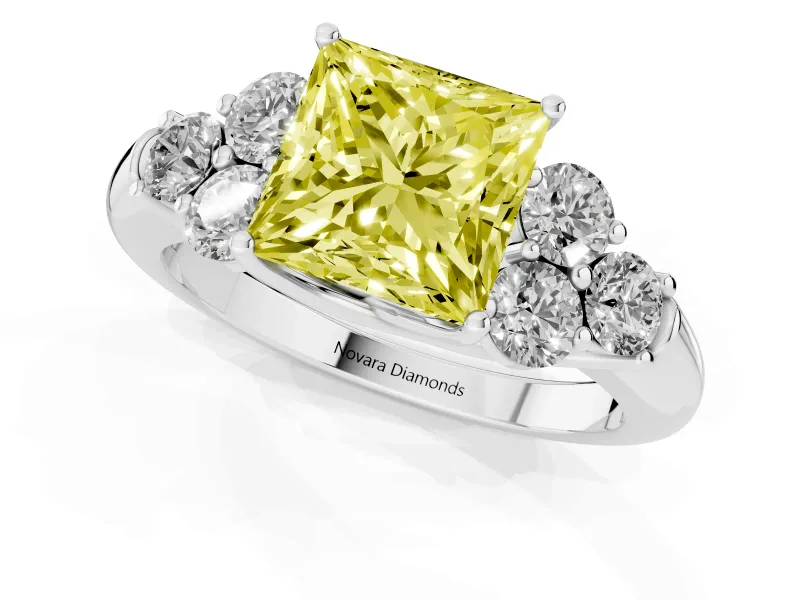 Fancy Yellow Princess Cut Diamond Cluster Ring Set in Platinum with Round Accent Stones and Prong Setting on a Plain Band