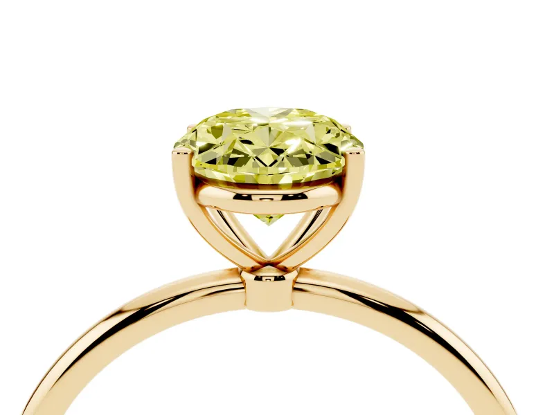 Fancy Yellow Oval Cut Diamond Solitaire Engagement Ring Set in Yellow gold with Thin Band and Prong Setting