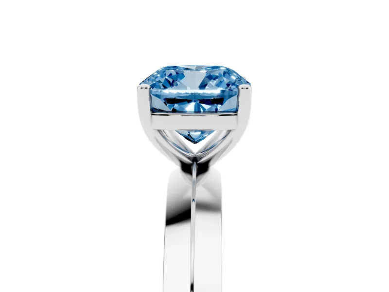 Fancy Blue Cushion Cut Diamond Solitaire Engagement Ring Set in White gold with Flat Band and Prong Setting