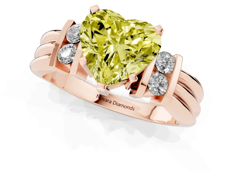 Fancy Yellow Three-Stone Heart Cut Diamond Channel Set Ring Set in Rose gold with Bar Prongs
