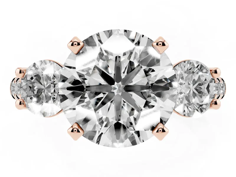 Three-Stone Round Cut Diamond Pavé Band Ring Set in Rose gold with Prong-Set Trio